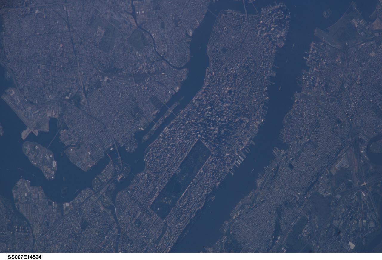 ISS007-E-14524 (7 September 2003) --- This view of New York City at dawn was taken by an Expedition 7 crewmember onboard the International Space Station (ISS). Central Park on Manhattan is just below center frame.