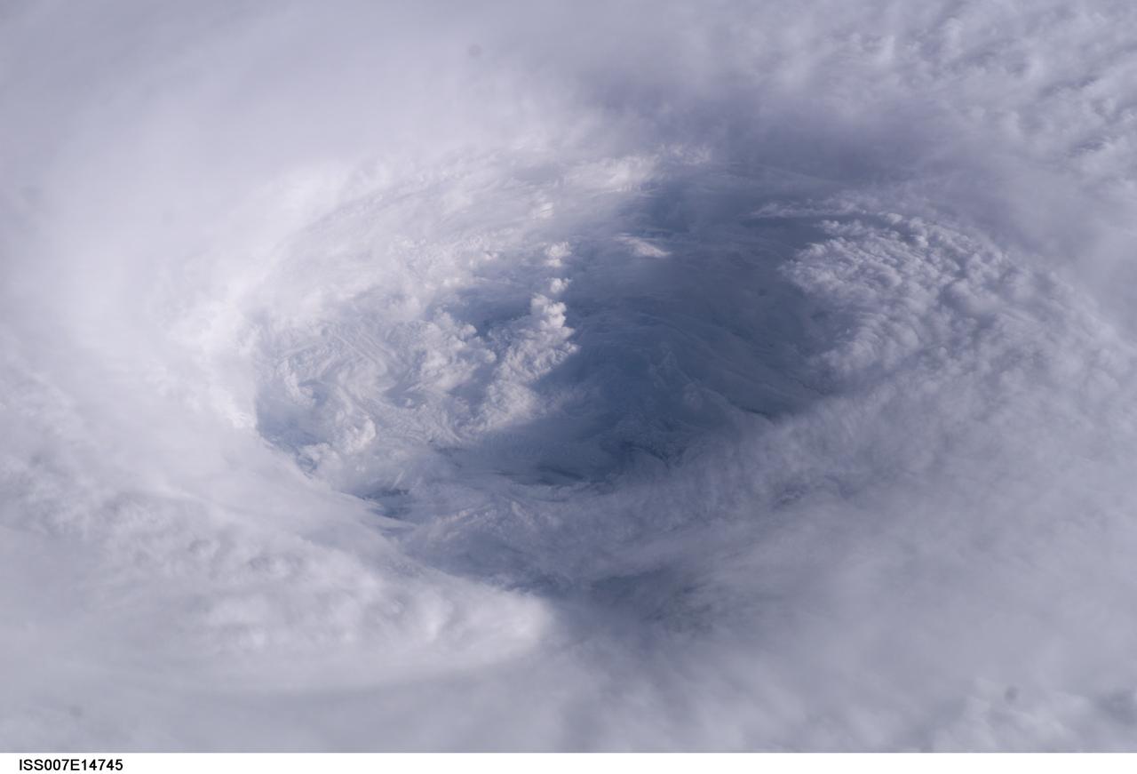 ISS007-E-14745 (13 September 2003) --- This close-up view of the eye of Hurricane Isabel was taken by one of the Expedition 7 crewmembers onboard the International Space Station (ISS). At the time this photo was taken, Isabel had reformed to a Category 5 storm, packing winds of 160 miles per hour.