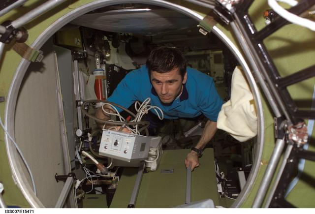 NASA image: Malenchenko with hardware for checkout of Orlan suits