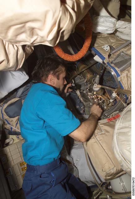NASA image: Malenchenko during checkout of Orlan spacesuits