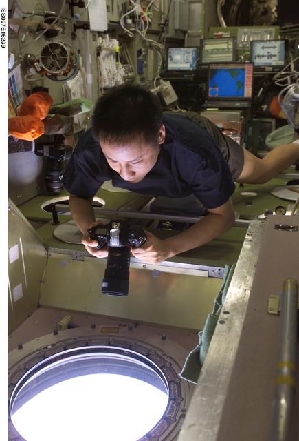 NASA image: Lu with camera in Zvezda