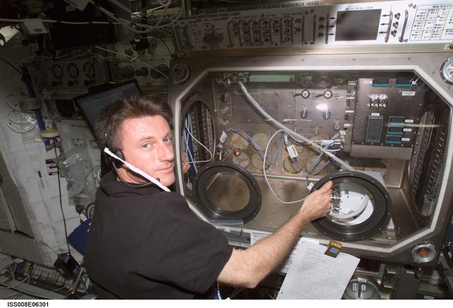 NASA image: Foale conducts MSG setup for PFMI experiment in U.S. Lab during Expedition 8