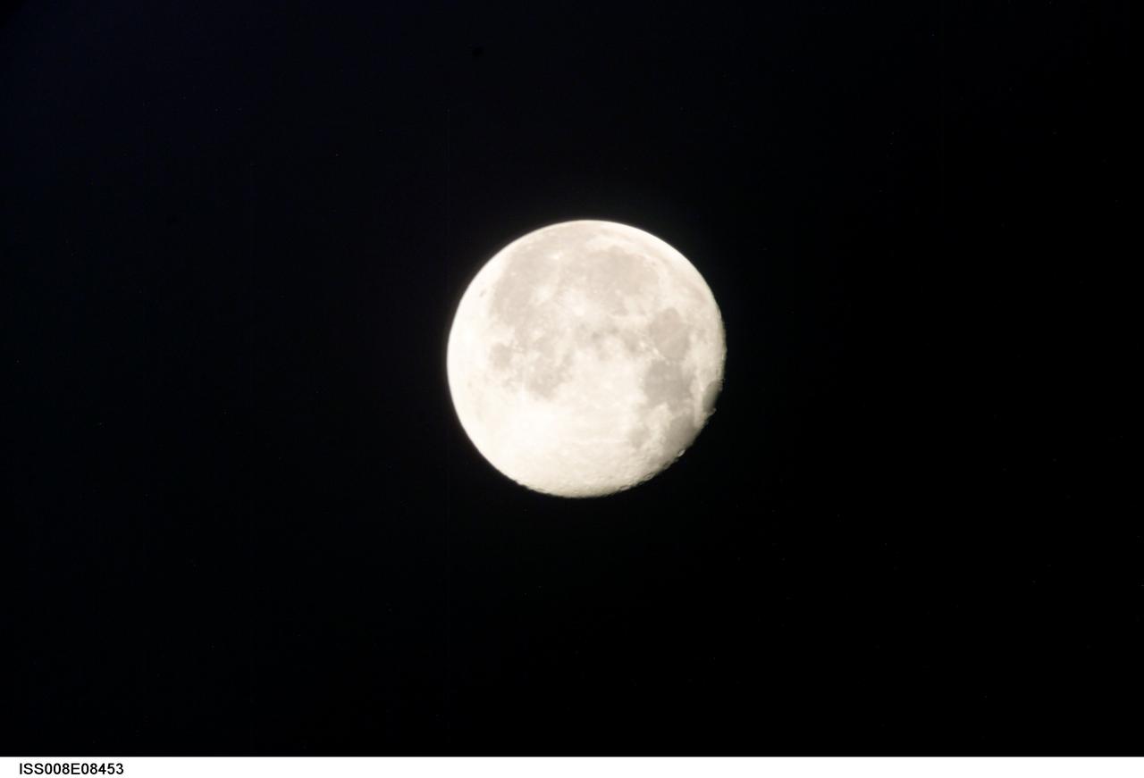 ISS008-E-08453 (10 December 2003) --- This view of a full moon was photographed by one of the Expedition 8 crewmembers aboard the International Space Station (ISS).