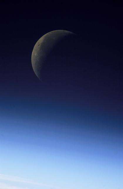 NASA image: View of the Crescent Moon / moonset taken during Expedition 8