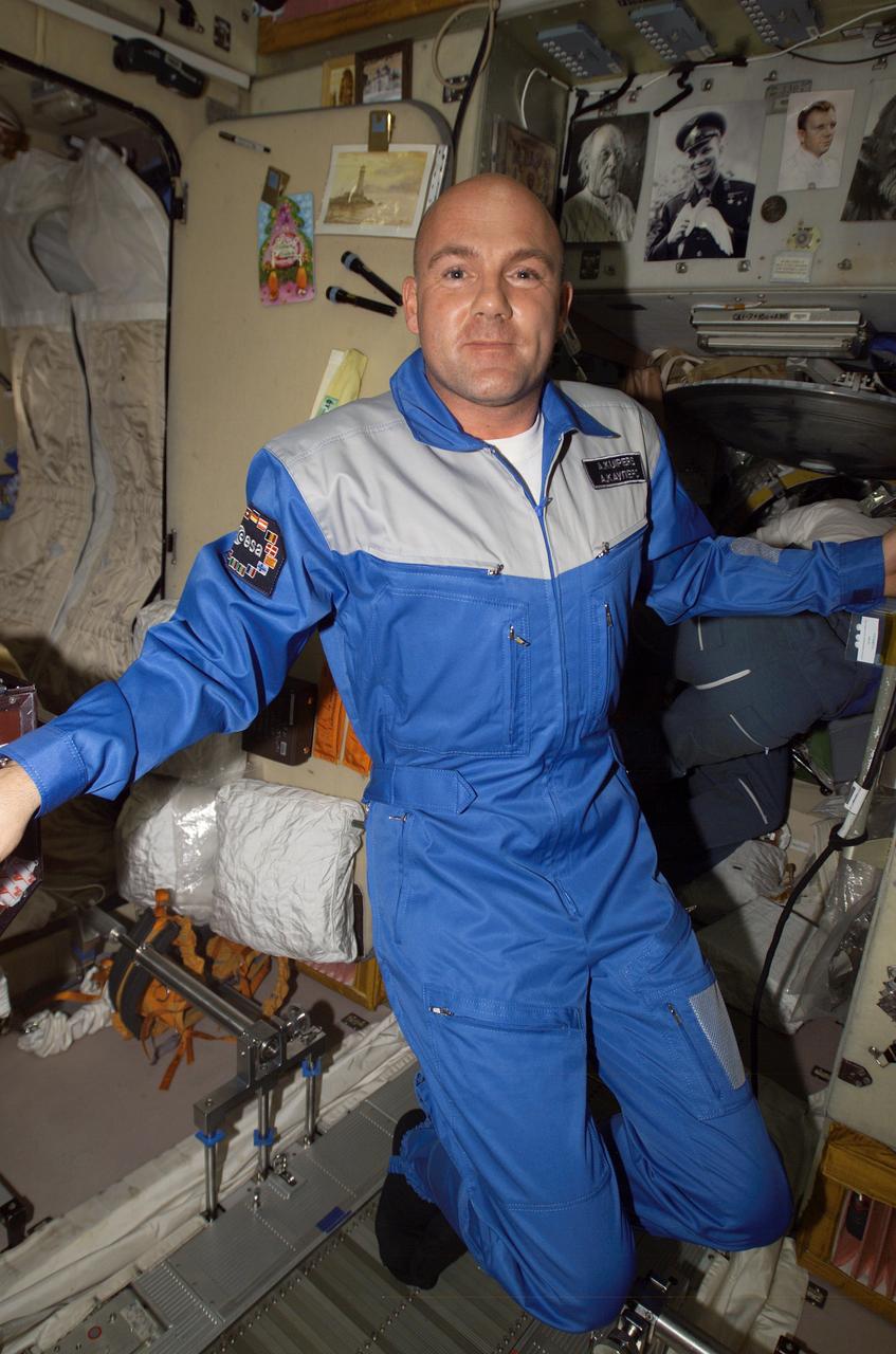ISS008-E-21951 (21 April 2004) --- European Space Agency (ESA) astronaut Andre Kuipers of the Netherlands floats in the Zvezda Service Module on the International Space Station (ISS).