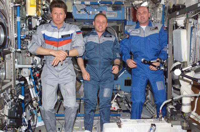 NASA image: Padalka, Fincke, and Kuipers pose in the U.S. Lab during EXP 9 / EXP 8