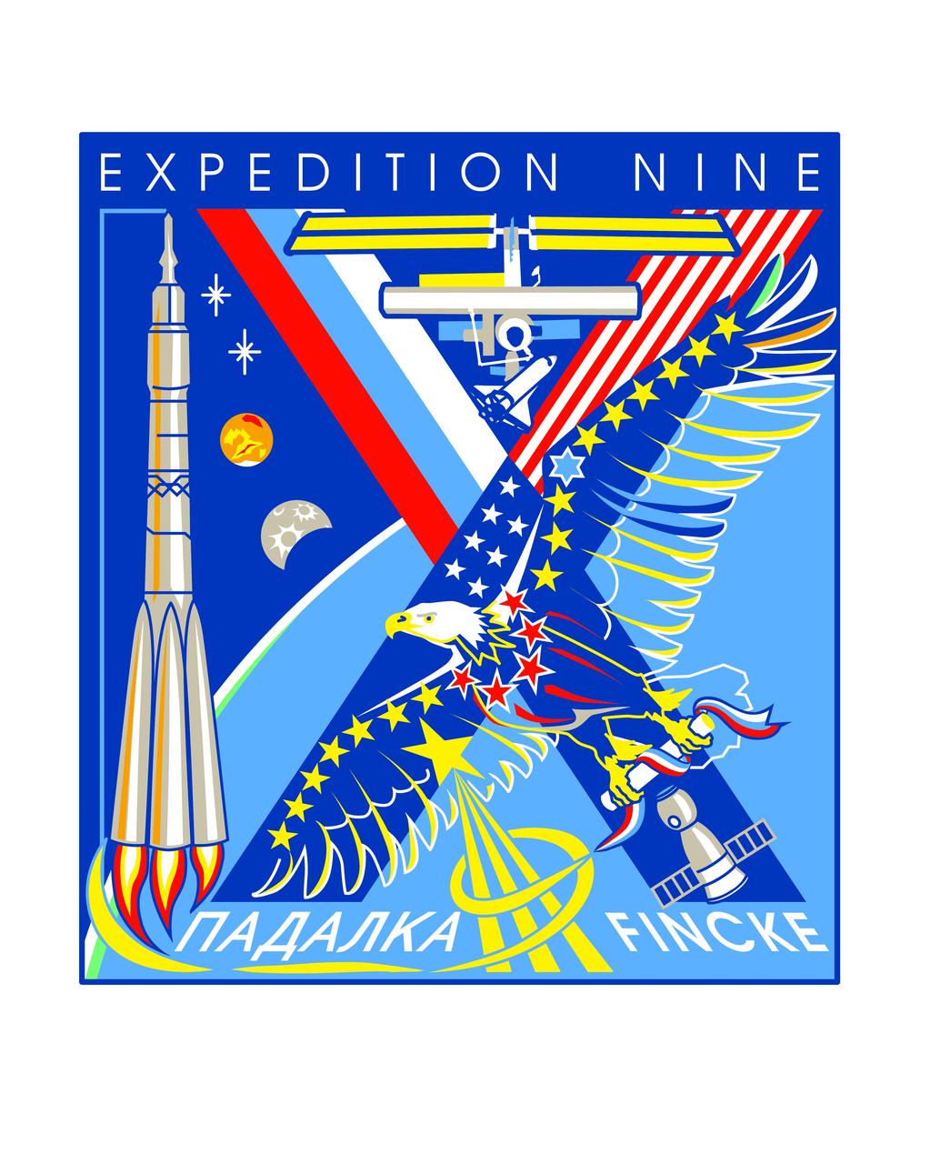 ISS009-S-001 (6 April 2004) --- This emblem represents the Ninth Expedition to the International Space Station (ISS). The Soyuz rocket and letter "X" combine into the Roman numeral IX.  The "X" evokes Exploration, which is at the core of the indivisible partnership of the two space pioneering nations. Research aboard ISS will lead to human exploration of the Moon and Mars. This pursuit is strengthened by the common memory of the astronauts and cosmonauts who gave their lives in this valiant endeavor. Their stars form the leading edge of the wings of the eagle spirit that embodies Human Space Flight. The Astronaut symbol is flanked by the Expedition Nine crew names leaning together, with a "9" stylized as the plume of their rocket. The baton of great discovery is passed to the crew of the spaceship advancing to their orbital outpost.     The NASA insignia design for shuttle flights and station increments is reserved for use by the astronauts and for other official use as the NASA Administrator may authorize. Public availability has been approved only in the forms of illustrations by the various news media. When and if there is any change in this policy, which is not anticipated, the change will be publicly announced.
