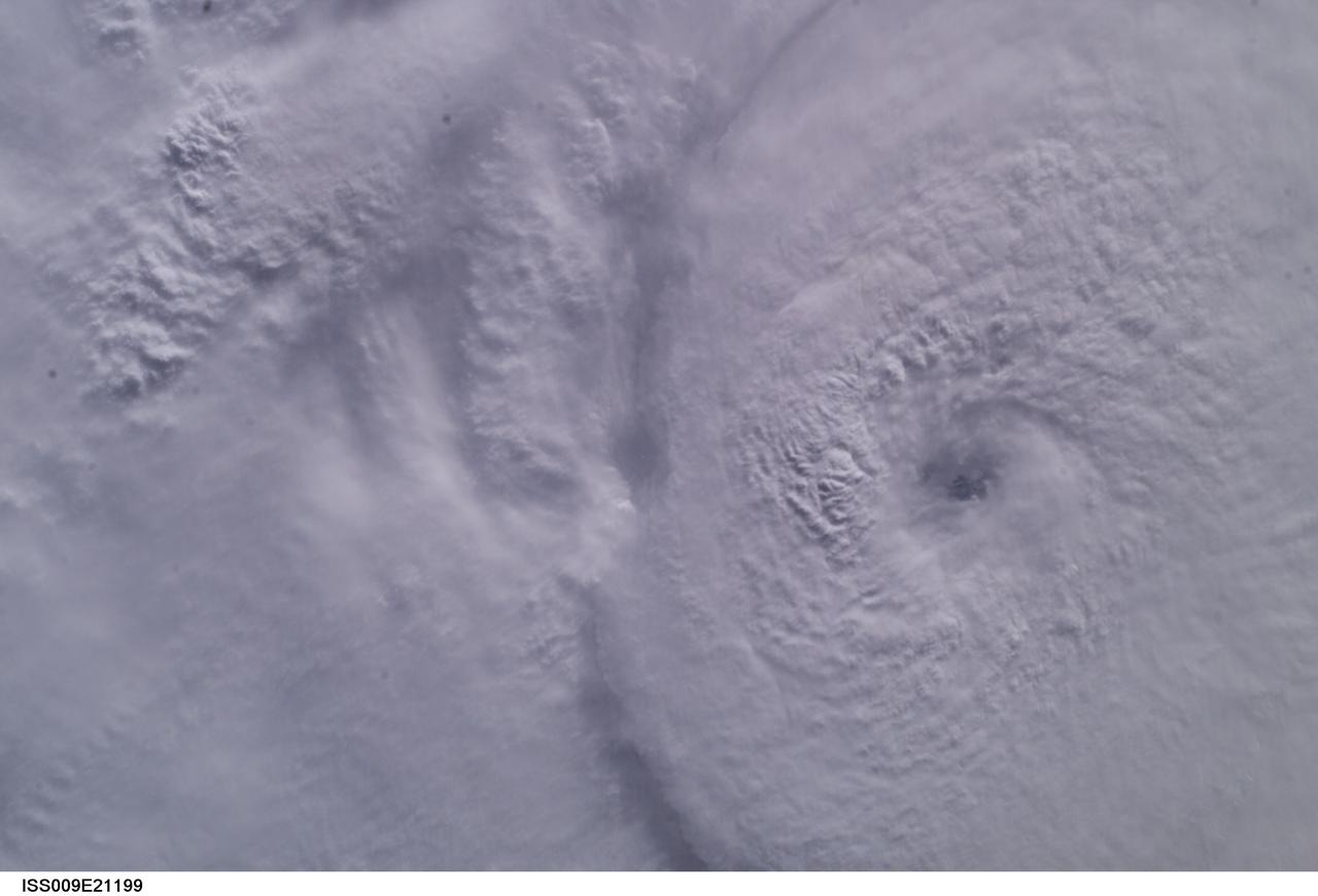 ISS009-E-21199 (2 September 2004) --- From 230 miles above, this is a nadir view of Hurricane Frances as it churned in the Atlantic Ocean almost 500 miles east-southeast of West Palm Beach, Fla., at about 8 a.m EDT Thursday, Sept. 2, 2004. At the time, Frances was a category 4 hurricane with winds of 145 mph. Astronaut Edward M. (Mike) Fincke took this photo through the window of the International Space Station. Expedition 9 Commander Gennady Padalka and Fincke, the NASA ISS Science Officer and Flight Engineer, are in the fifth month of a six-month stay on the orbiting research platform.