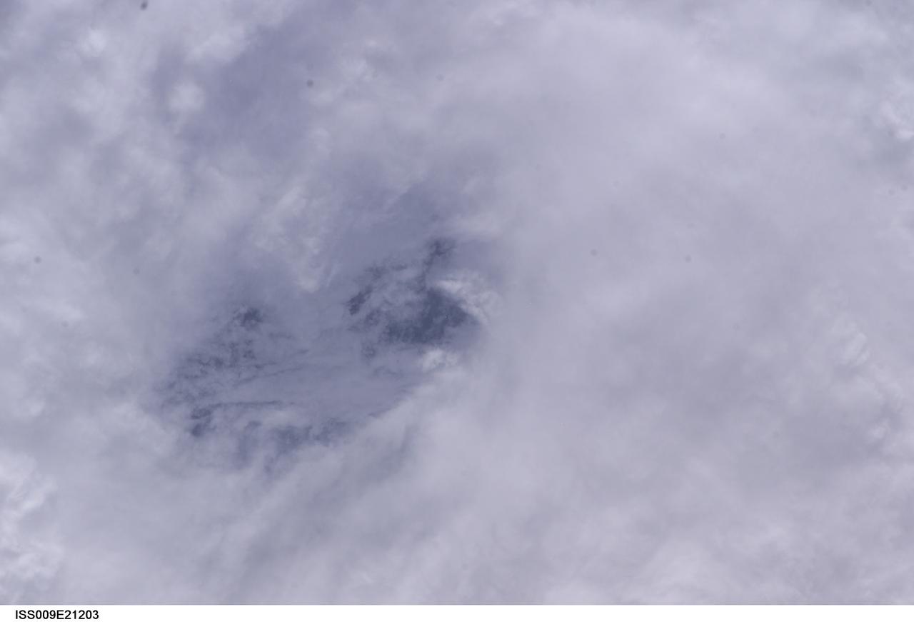 ISS009-E-21203 (2 September 2004) --- From 230 miles above, this is a view into the eye of Hurricane Frances as it churned in the Atlantic Ocean almost 500 miles east-southeast of West Palm Beach, Fla., at about 8 a.m EDT Thursday, Sept. 2, 2004. At the time, Frances was a category 4 hurricane with winds of 145 mph. Astronaut Edward M. (Mike) Fincke took this photo through the window of the International Space Station. Expedition 9 Commander Gennady Padalka and Fincke, the NASA ISS Science Officer and Flight Engineer, are in the fifth month of a six-month stay on the orbiting research platform.