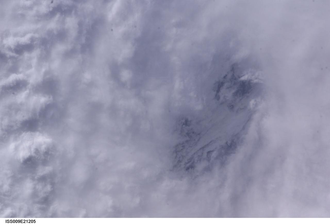 ISS009-E-21205 (2 September 2004) --- From 230 miles above, this is a view into the eye of Hurricane Frances as it churned in the Atlantic Ocean almost 500 miles east-southeast of West Palm Beach, Fla., at about 8 a.m EDT Thursday, Sept. 2, 2004. At the time, Frances was a category 4 hurricane with winds of 145 mph. Astronaut Edward M. (Mike) Fincke took this photo through the window of the International Space Station. Expedition 9 Commander Gennady Padalka and Fincke, the NASA ISS Science Officer and Flight Engineer, are in the fifth month of a six-month stay on the orbiting research platform.