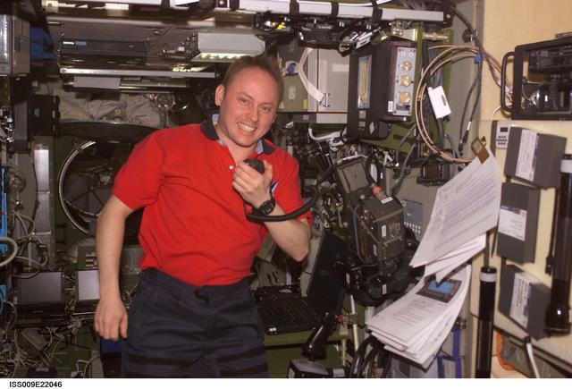 NASA image: Fincke talks on the ISS HAM Radio in the SM during Expedition 9