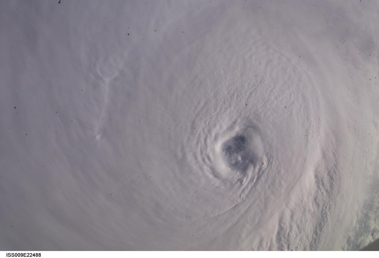 ISS009-E-22488 (13 September 2004) ---- The eye of Hurricane Ivan, swirling with sustained winds of 160 mph at the time, was photographed as the storm entered the Gulf of Mexico late Monday (22:38:37 GMT, Sept. 13) by astronaut Edward M. (Mike) Fincke, 230 miles above the Earth aboard the International Space Station. Fincke and Station Commander Gennady Padalka are in the final month of a six-month stay aboard the research complex.