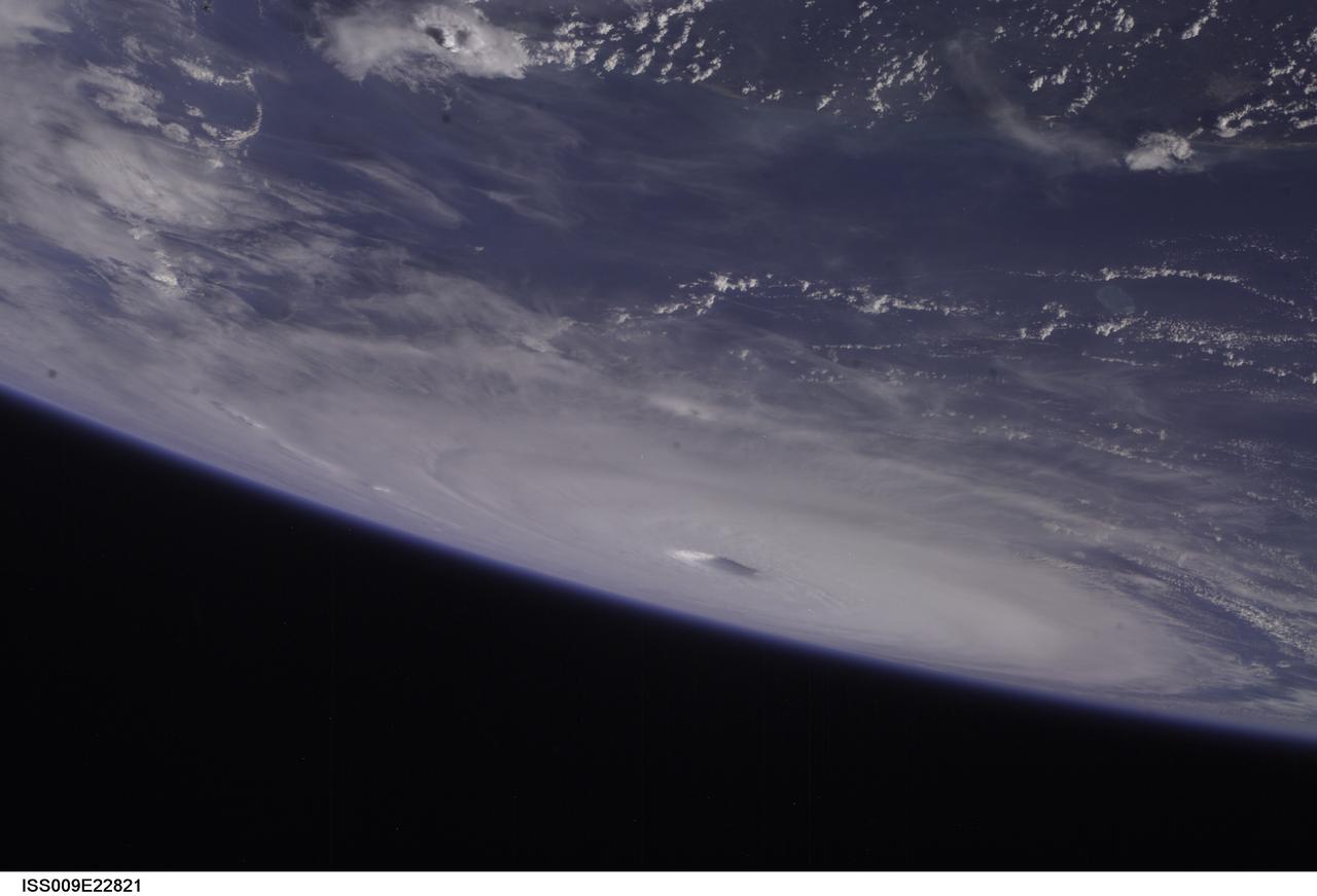 ISS009-E-22821 (15 September 2004) -- Hurricane Ivan fills the northern Gulf of Mexico in this photo taken by astronaut Edward M. (Mike) Fincke as the storm approached landfall on the Alabama coast Wednesday afternoon (21:59:25 GMT, Sept. 15). Ivan was reported to have sustained winds of 135 mph. This photo was taken from an altitude of about 230 miles. Fincke, the NASA ISS Science Officer, and Commander Gennady Padalka are nearing the end of a six-month mission aboard the research outpost.