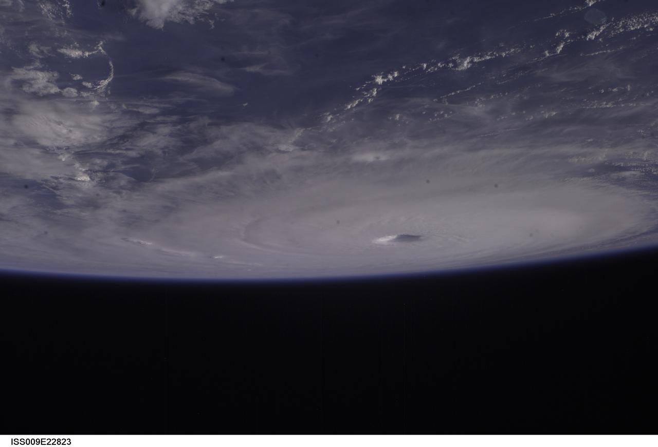 ISS009-E-22823 (15 September 2004) -- Hurricane Ivan fills the northern Gulf of Mexico in this photo taken by astronaut Edward M. (Mike) Fincke as the storm approached landfall on the Alabama coast Wednesday afternoon (21:59:36 GMT, Sept. 15). Ivan was reported to have sustained winds of 135 mph. This photo was taken from an altitude of about 230 miles. Fincke, the NASA ISS Science Officer, and Commander Gennady Padalka are nearing the end of a six-month mission aboard the research outpost.