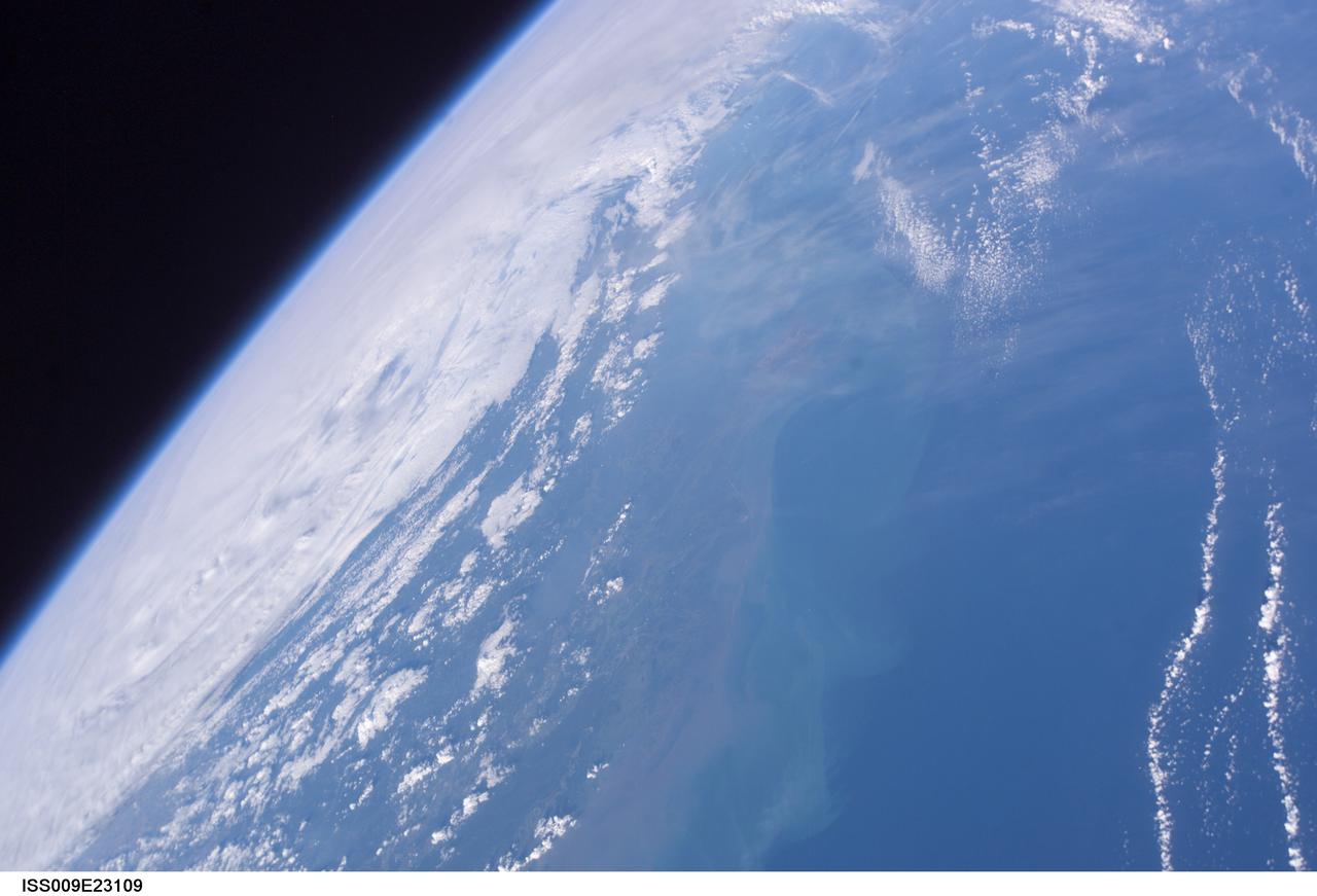 ISS009-E-23109 (16 September 2004) --- Hurricane Ivan moves inland as photographed by astronaut Edward M. (Mike) Fincke aboard the International Space Station on Thursday afternoon (22:28:48 GMT, Sept. 16). Ivan made landfall early Thursday near Pensacola, Fla. and the Florida-Alabama border. The Gulf Coast is visible in bottom of the photo.