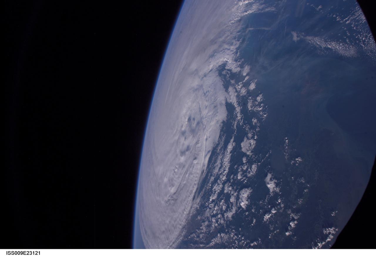 ISS009-E-23121 (16 September 2004) --- Hurricane Ivan moves inland as photographed by astronaut Edward M. (Mike) Fincke aboard the International Space Station on Thursday afternoon (22:21:34 GMT, Sept. 16). Ivan made landfall early Thursday near Pensacola, Fla. and the Florida-Alabama border.