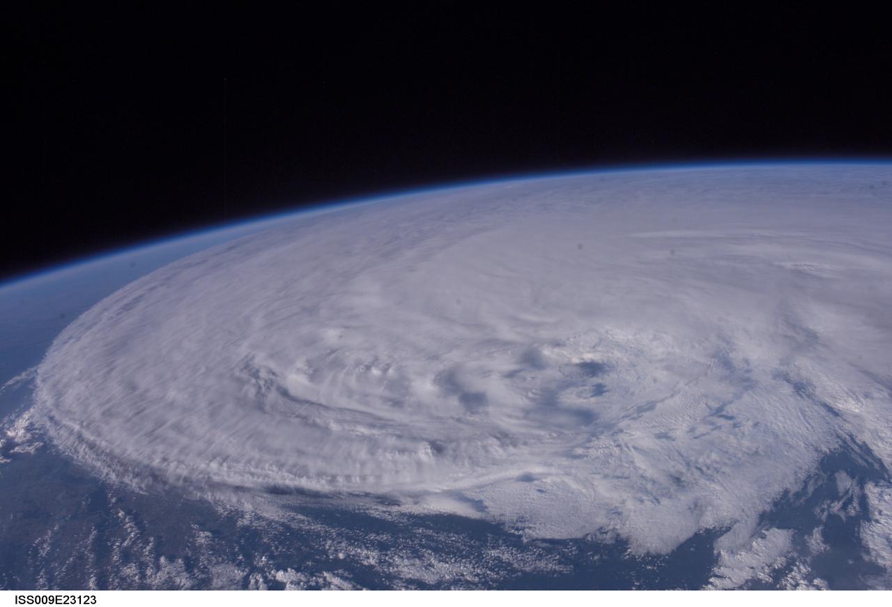 ISS009-E-23123 (16 September 2004) --- Hurricane Ivan moves inland as photographed by astronaut Edward M. (Mike) Fincke aboard the International Space Station on Thursday afternoon (22:29:50 GMT, Sept. 16). Ivan made landfall early Thursday near Pensacola, Fla. and the Florida-Alabama border.