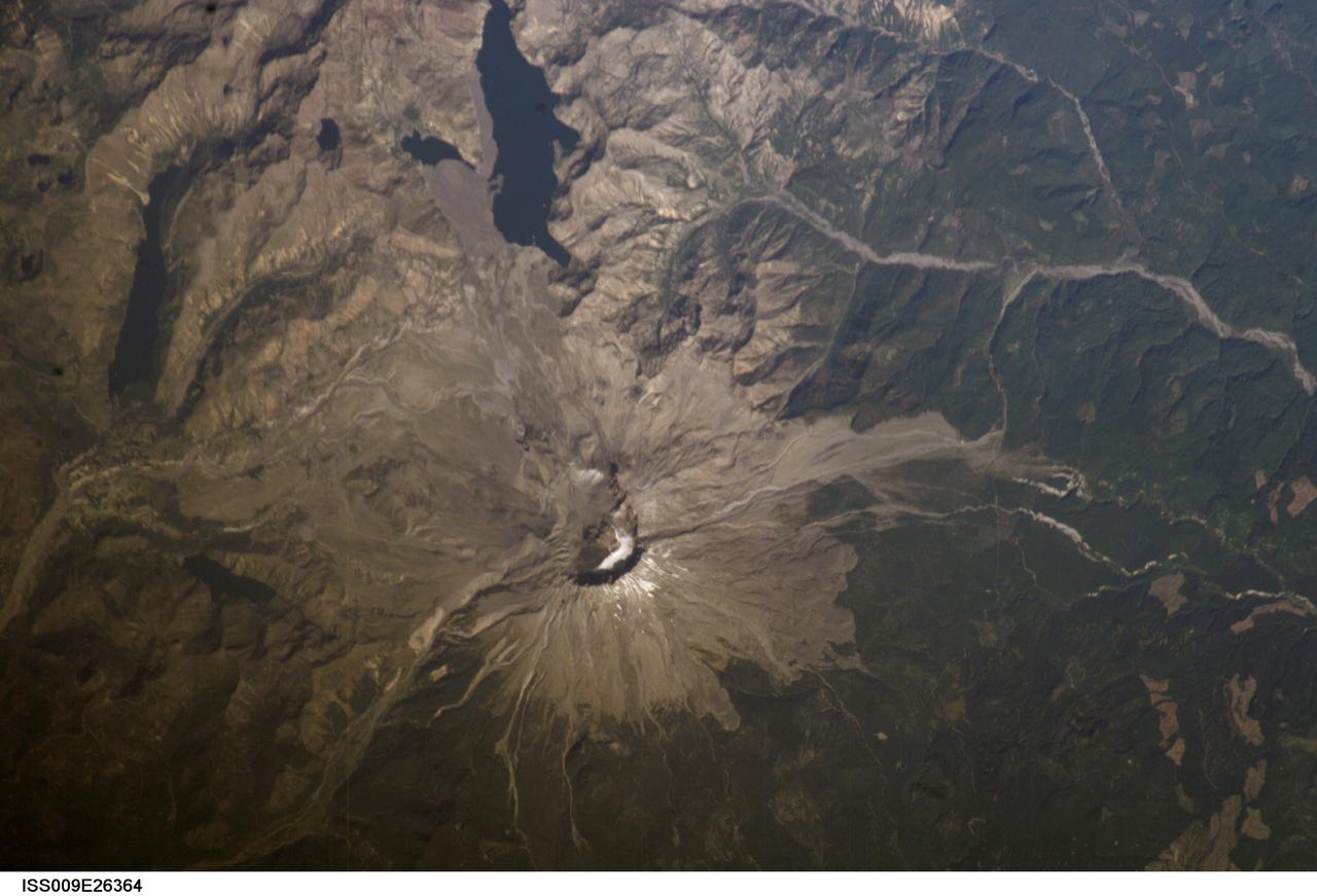 ISS009-E-26364 (1 October 2004) --- Mount Saint Helens, Washington, is featured in this image photographed by an Expedition 9 crewmember on the International Space Station (ISS). The USGS has been monitoring Mount Saint Helens closely since last Thursday, when the volcano began to belch steam and swarms of tiny earthquakes were first recorded.