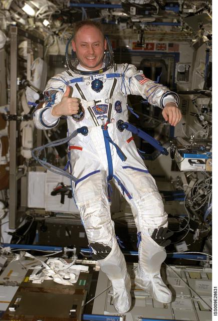 NASA image: Fincke wears his Russian Sokol pressure suit in the U.S. Lab module during Expedition 9
