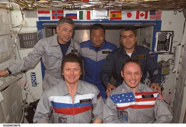 NASA image: Expedition 9 and 10 crewmembers pose for a crew photo during Exp. 9/10 joint operations