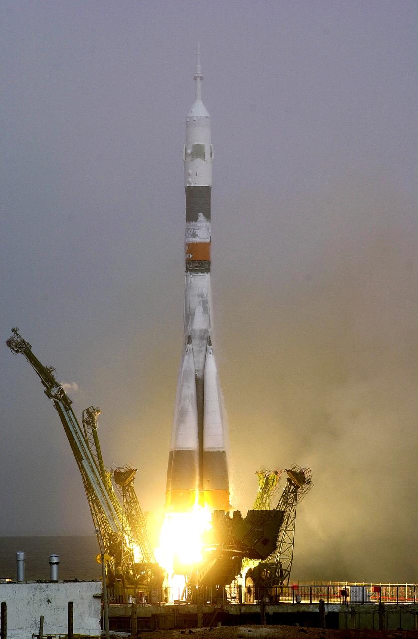 ISS01-S-006 (31 October 2000) --- A Soyuz spacecraft lifts off from the Baikonur Cosmodrome at 10:53 a.m.  Kazakhstan time.  Onboard were Expedition One commander William M. (Bill) Shepherd,  Soyuz commander Yuri P. Gidzenko and Sergei K. Krikalev, flight engineer.