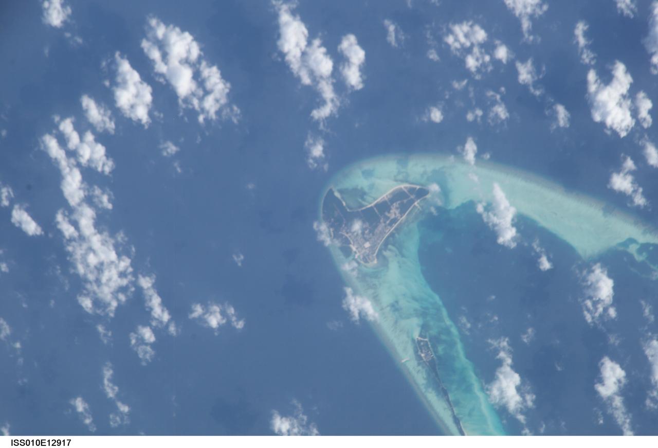 ISS010-E-12917 (13 January 2005) --- One of a series of post-tsunami digital still images photographed from the International Space Station on January 13, 2005. This image, centered at 4.9 degrees north latitude and 72.9 degrees east longitude, and one of several showing the Maldives, shows the east portion of Goidhoo (also called Horsburgh) Atoll. Also visible are Goidhoo (Goidu) Island and Fehendoo (Fehendu) Island. Information is sketchy on how much damage was actually sustained in the region, but NASA scientists studying the ISS imagery say that coral reefs likely mitigated the damage level.