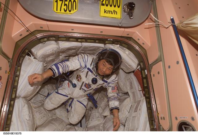 NASA image: Chiao wearing Sokol suit in the Node 1 taken during Expedition 10