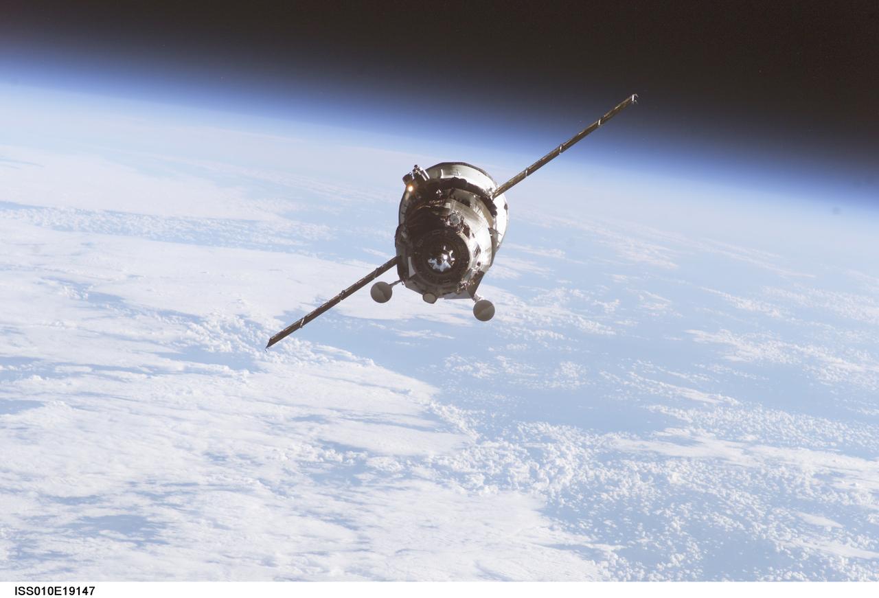 ISS010-E-19147 (2 March 2005) --- Backdropped by the blackness of space and Earth’s horizon, an unpiloted Progress supply vehicle approaches the International Space Station (ISS). The Progress 17 resupply craft launched at 1:09 p.m. (CST) on February 28, 2005 from the Baikonur Cosmodrome in Kazakhstan to deliver two tons of supplies, food, water, fuel and equipment to the Expedition 10 crewmembers onboard the Station. Progress docked to the aft port of the Zvezda Service Module at 2:10 p.m. (CST) on March 2 as the Station flew 225 statute miles over the equator west of Africa.