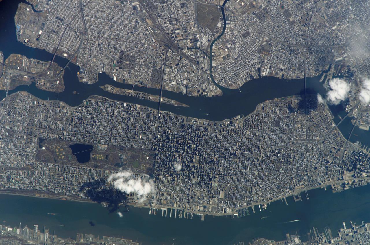 ISS010-E-21487 (26 March 2005) --- Manhattan Island and its easily recognizable Central Park are featured in this image photographed by an Expedition 10 crewmember on the International Space Station. Some of the other New York City boroughs (including parts of Queens and Brooklyn) are also shown, as are two small sections of the New Jersey side of the Hudson River.
