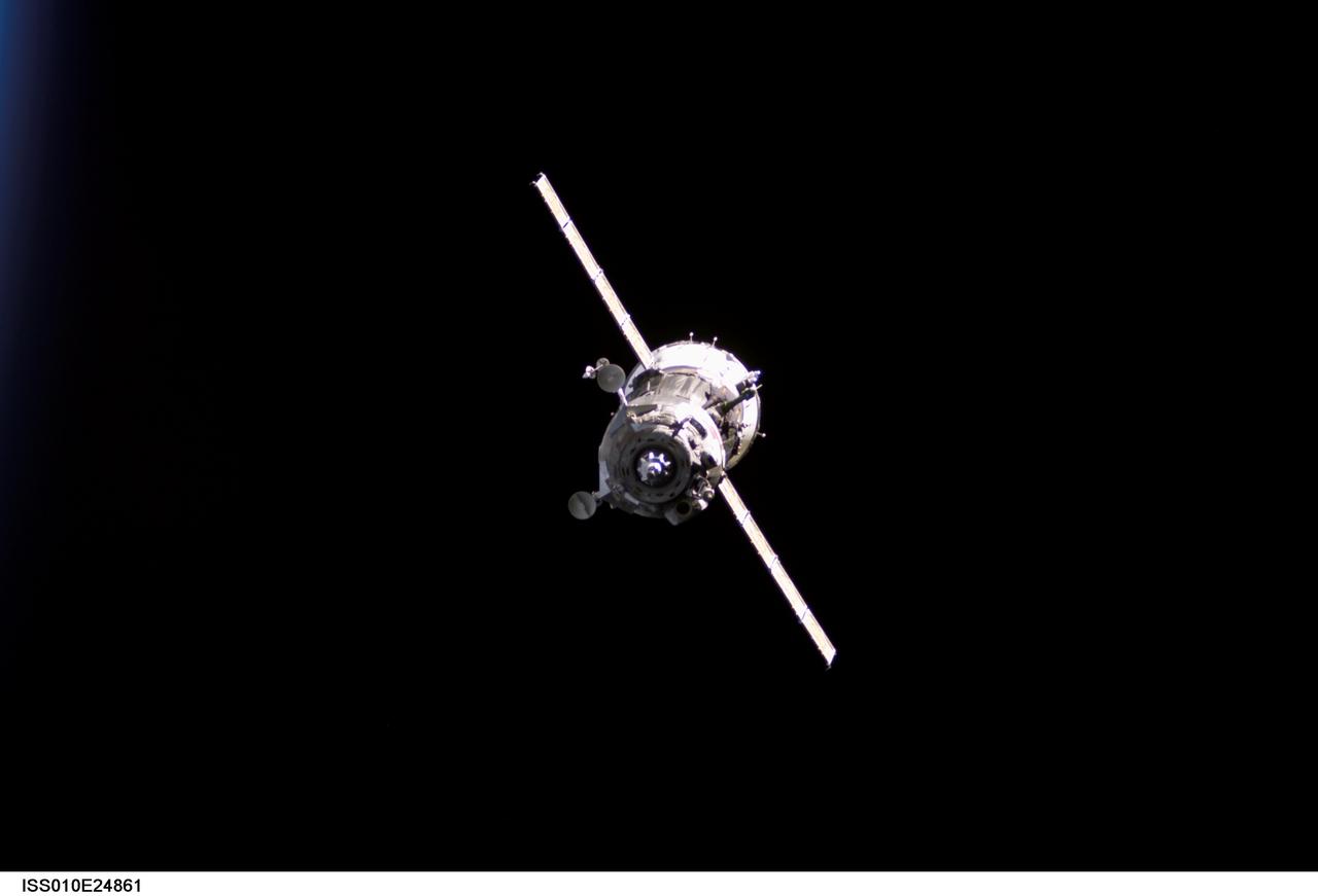 ISS010-E-24861 (16 April 2005) --- Backdropped by the blackness of space, the Soyuz TMA-6 spacecraft approaches the International Space Station (ISS). Onboard the spacecraft are cosmonaut Sergei K. Krikalev, Expedition 11 commander representing Russia's Federal Space Agency; astronaut John L. Phillips, NASA ISS science officer and flight engineer; and European Space Agency (ESA) astronaut Roberto Vittori of Italy. The Soyuz linked to the Pirs Docking Compartment at 9:20 p.m. (CDT) on April 16, 2005 as the two spacecraft flew over eastern Asia. The docking followed Friday’s launch from the Baikonur Cosmodrome in Kazakhstan.