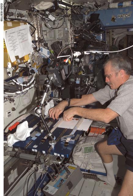 NASA image: Phillips works on MFMG (Miscible Fluids in Microgravity) payload activities