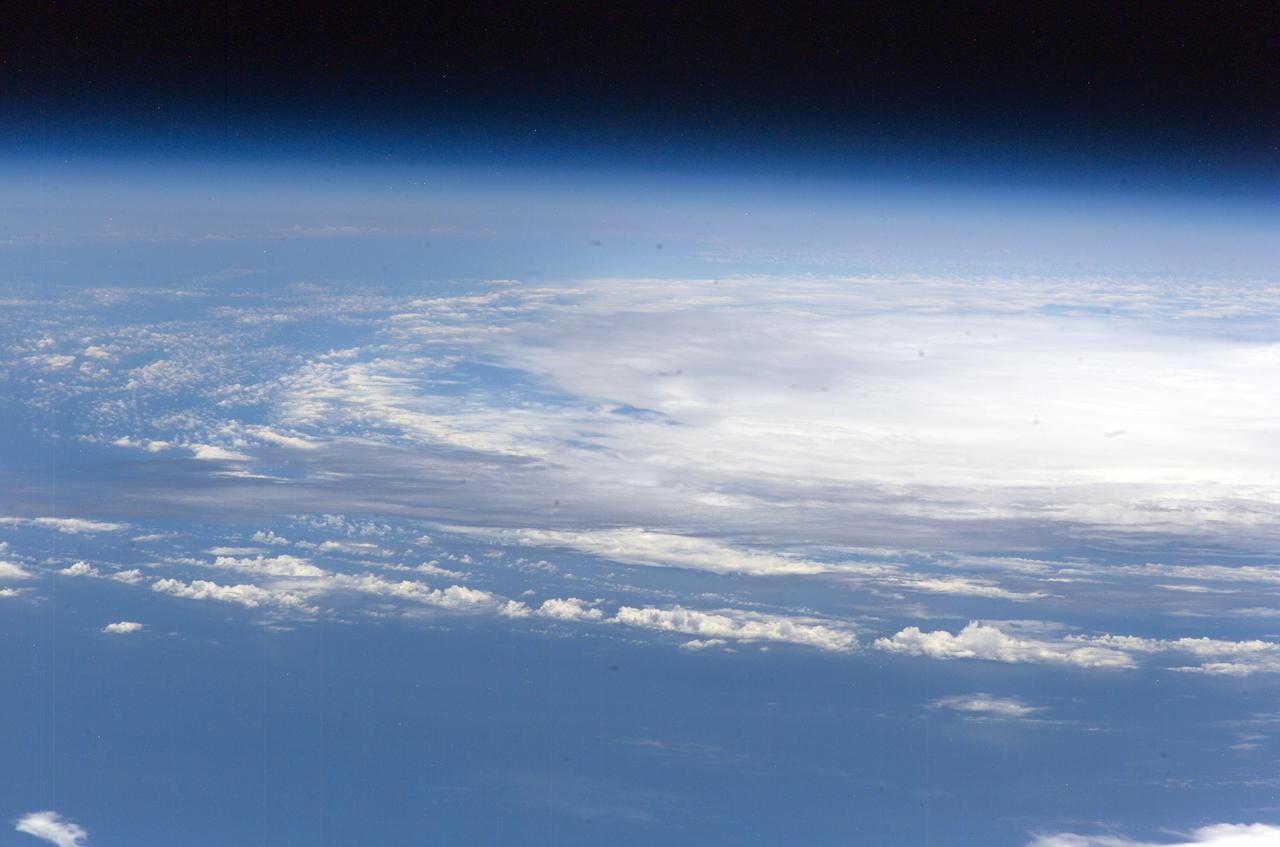 ISS011-E-08482   (11 June 2005)  --- From 225 miles above Earth, the crew members aboard the International Space Station captured early tropical activity of the 2005 season, using an Electronic Still Camera.  At the time of this photo (17:27:29 GMT, June 11, 2005), tropical storm Arlene was about two hours away from making landfall near Gulf Shores, AL with 60 mph winds. This frame and ISS011-E-08483 together encompass the entire body of the disorganized storm.  View is from the southeast over the central Bahamas.