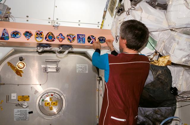 NASA image: Krikalev with mission patch in Node 1 / Unity module