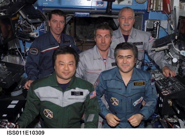 ISS011-E-10309 (21 April 2005) --- The crewmembers onboard the International Space Station gather for an in-flight group photo in the Destiny laboratory. From the left (front row) are astronaut Leroy Chiao, Expedition 10 commander and NASA Space Station science officer; and cosmonaut Salizhan S. Sharipov, Expedition 10 flight engineer representing Russia's Federal Space Agency. From the left (back row) are European Space Agency (ESA) astronaut Roberto Vittori of Italy; cosmonaut Sergei K. Krikalev, Expedition 11 commander representing Russia's Federal Space Agency; and astronaut John L. Phillips, Expedition 11 NASA Space Station science officer and flight engineer.