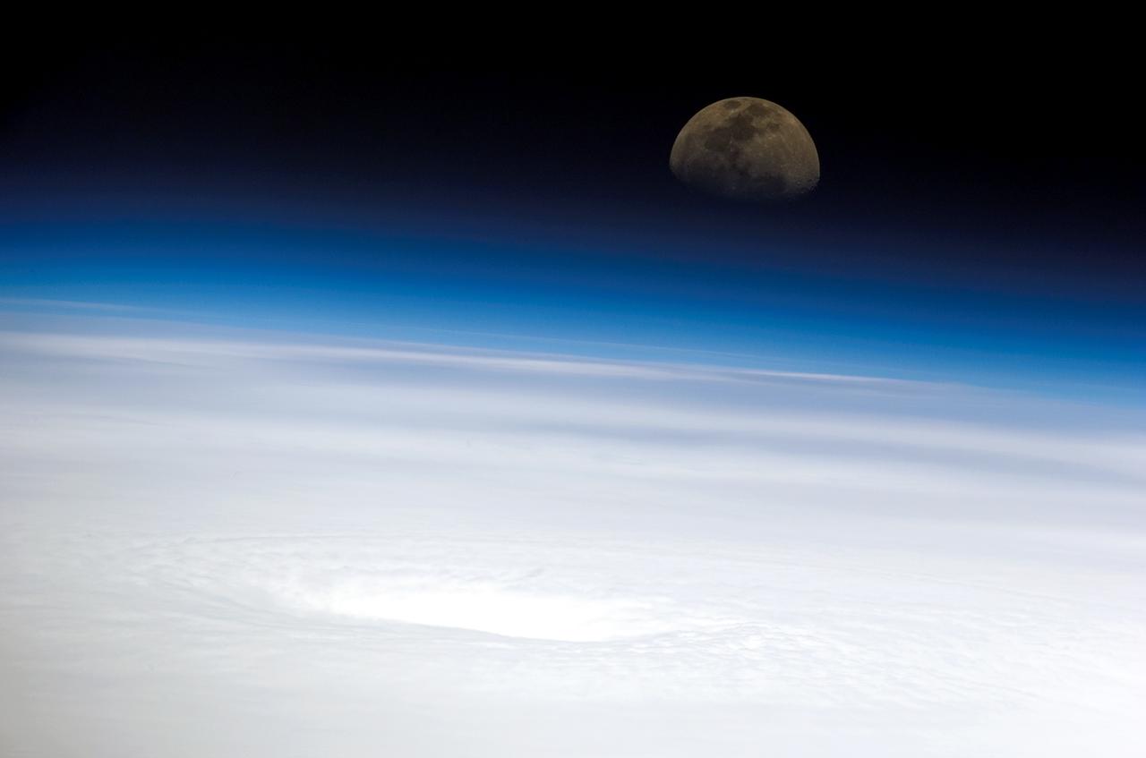 ISS011-E-10509 (16 July 2005) --- This high-oblique panoramic view, recorded by a digital still camera using a 400mm lens, shows the eye of Hurricane Emily. The image was captured by the crew of the international space station while the complex was over the southern Gulf of Mexico looking eastwardly toward the rising moon. At the time, Emily was a strengthening Category 4 hurricane with winds of nearly 155 miles per hour and moving west-northwestwardly over the northwest Caribbean Sea about 135 miles southwest of Kingston, Jamaica.
