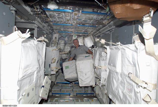 NASA image: Philips with stowage bags in MPLM