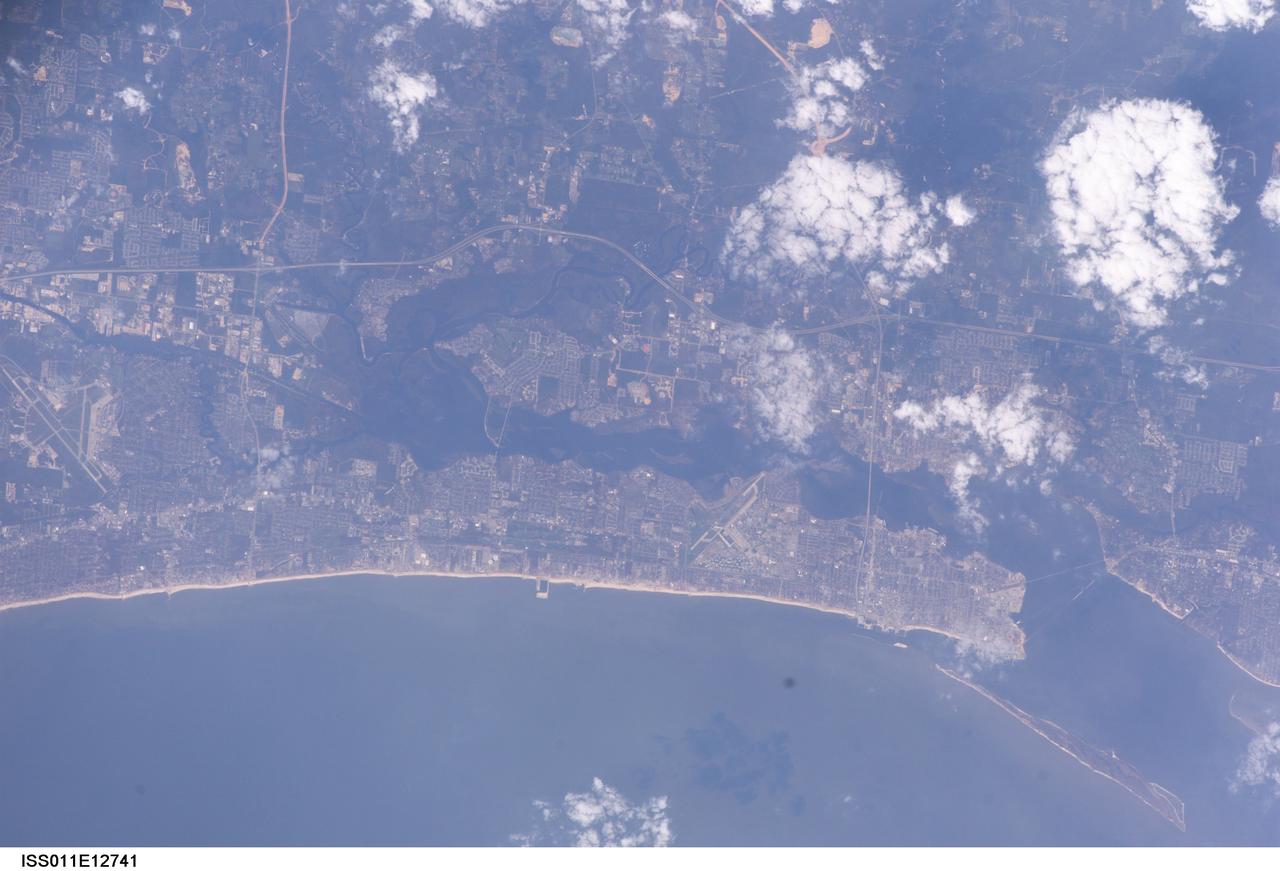 ISS011-E-12741 (10 September 2005) --- This image of the Biloxi, Mississippi area of the Central Gulf Coast was captured by the Expedition 11 crew aboard the International Space Station on the afternoon of September 10, 2005. A 400-mm lens was used on a digital still camera to record the image.