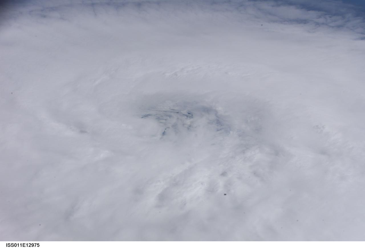 ISS011-E-12975 (14 September 2005, 19:13:58 GMT) --- This high oblique 80-mm image of Hurricane Ophelia was taken on the afternoon of September 14 from the International Space Station. The ill-defined eye is located at center of the frame. The slow-moving storm is off the coast of the Carolinas.