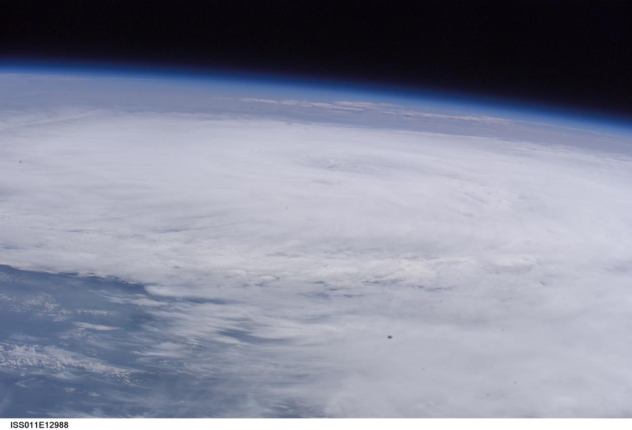 ISS011-E-12988 (14 September 2005, 19:16:29 GMT) --- This oblique view of Hurricane Ophelia was taken on the afternoon of September 14 from the International Space Station. The somewhat ill-defined eye is located just above right center. The slow-moving storm is off the coast of the Carolinas.