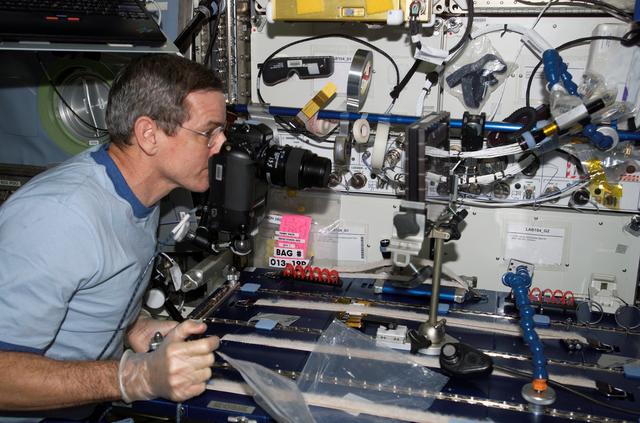 NASA image: McArthur photographs BCAT-3 samples during Expedition 12