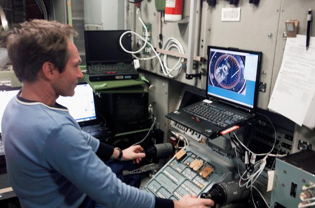 NASA image: Tokarev conducts onboard training for relocation of Soyuz TMA-7 during Expedition 12