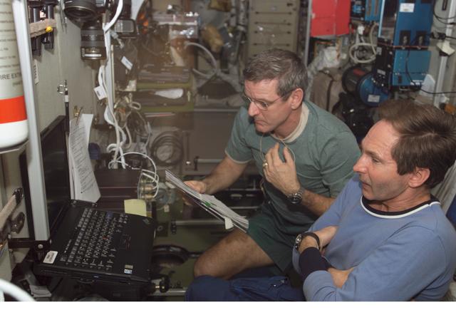 NASA image: Tokarev conducts onboard training for relocation of Soyuz TMA-7 during Expedition 12