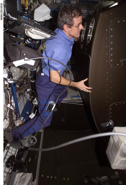 NASA image: McArthur rotates the CHeCS Rack during Expedition 12