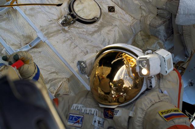 NASA image: Tokarev outside the ISS during the second EVA on Expedition 12