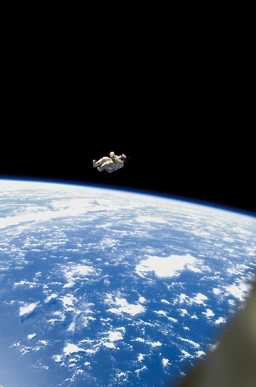 ISS012-E-16908 (3 Feb. 2006) --- Backdropped by the blackness of space and Earth&#0146;s horizon, a spacesuit-turned-satellite called SuitSat began its orbit around the Earth after it was released by the Expedition 12 crewmembers during a session of extravehicular activity (EVA) on Feb. 3, 2006. SuitSat, an unneeded Russian Orlan spacesuit, was outfitted by the crew with three batteries, internal sensors and a radio transmitter, which faintly transmitted recorded voices of school children to amateur radio operators worldwide. The suit will enter the atmosphere and burn up in a few weeks.