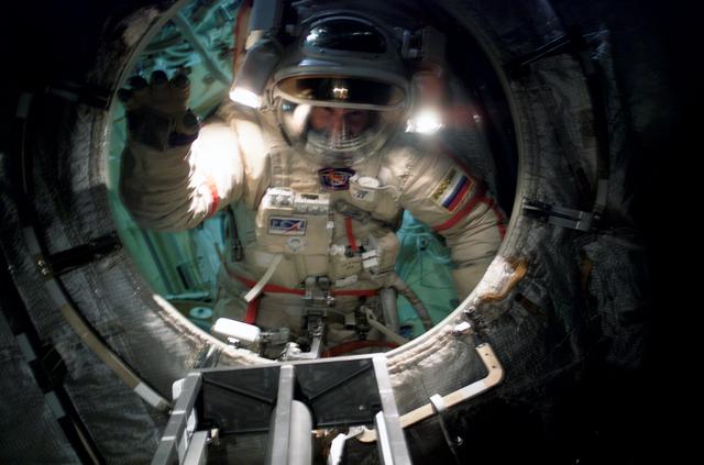 NASA image: Tokarev inside the DC1 upon completion of EVA 2 during Expedition 12