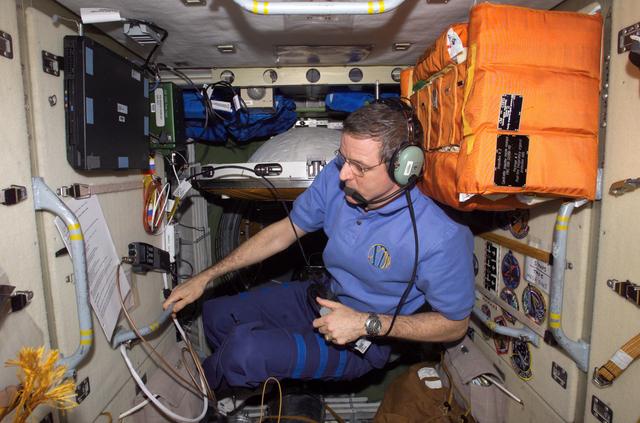 NASA image: McArthur talks on the ARISS HAM Radio during Expedition 12