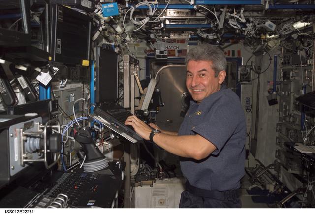 NASA image: Brazilian Astronaut Marcos Pontes uses a computer during Expedition 12/13 joint operations