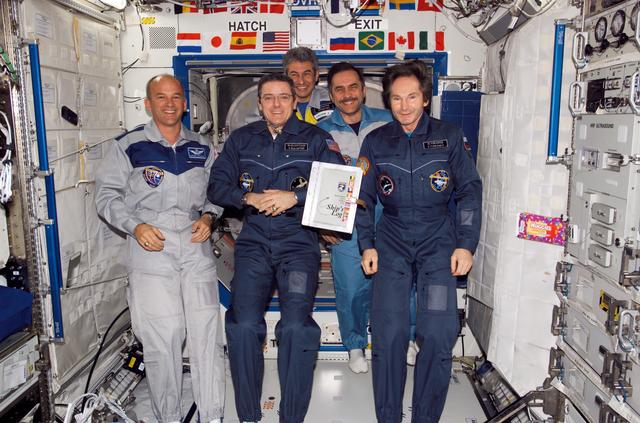 NASA image: Group shot of crews at the Change of Command Ceremony during Expedition 12/13 Joint Operations