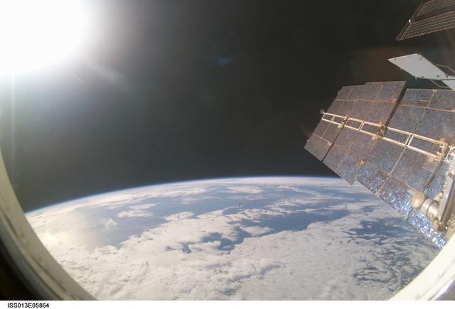 NASA image: Setting sun on Earths horizon taken by Expedition 13 crew member